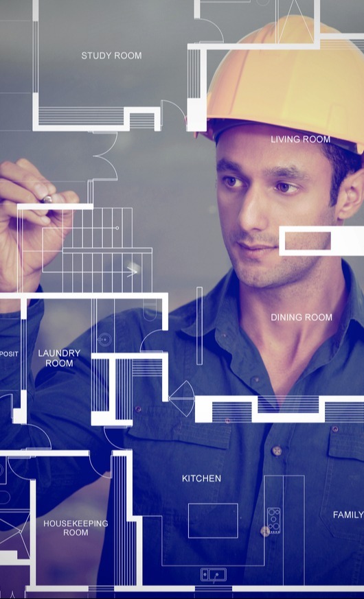 Construction worker wearing a helmet and sketching blueprints-1
